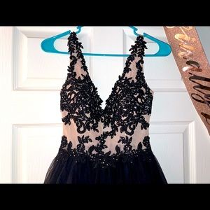 This can either be a homecoming or prom dress!